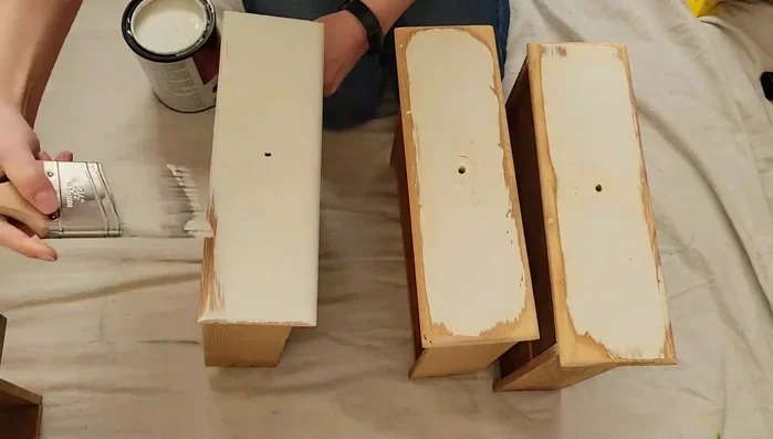 Protect the top surface with tape during painting.