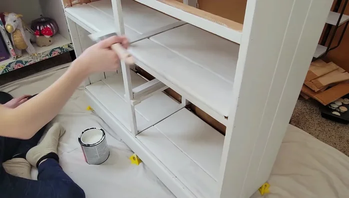 Protect the top surface with tape during painting.