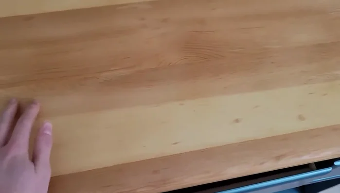 Apply contact paper to the back and inside of the shelves for a finished look.