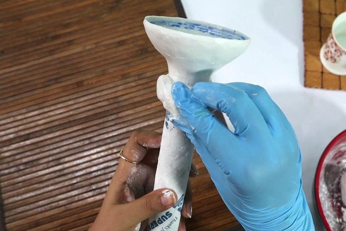 Shape and design: Gradually build up the design, shaping the putty as you go. Allow ample drying time between layers. (This process may take 1-2 days).