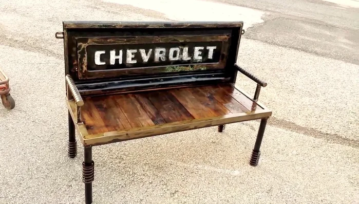 Helicopter-inspired bench with snow chain and rebar