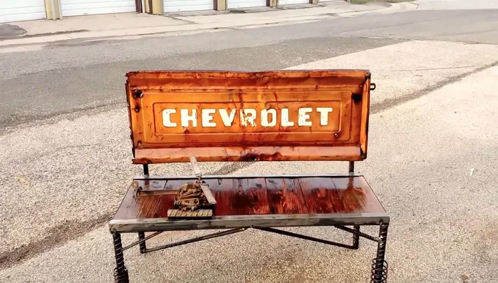 Helicopter-inspired bench with snow chain and rebar