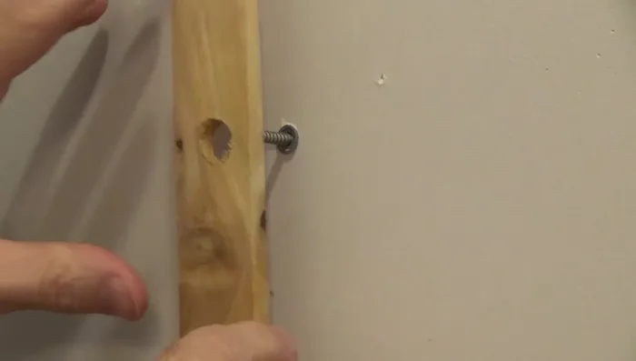 For lath & plaster walls: Use pliers to pull out the anchor.