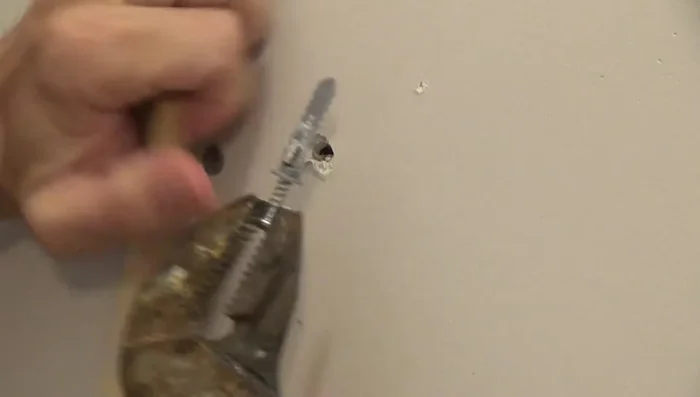 For lath & plaster walls: Use pliers to pull out the anchor.