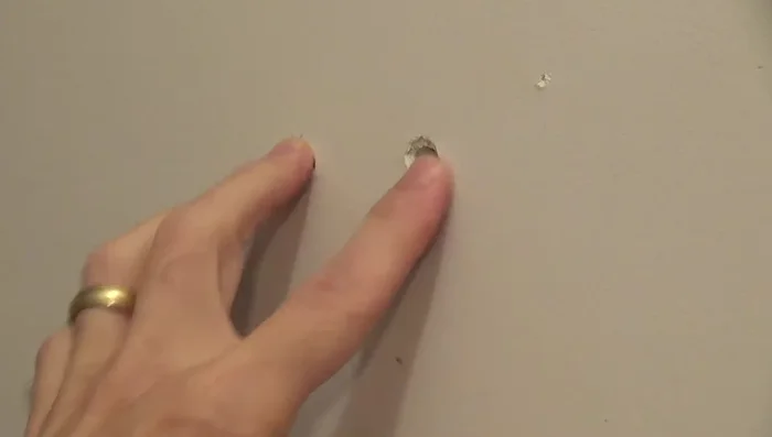 Fill any holes left behind with spackle.