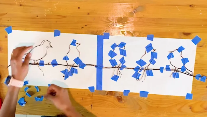 Remove masking tape: Carefully remove the masking tape from the finished project.