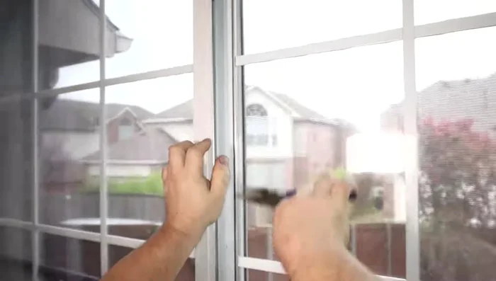 Remove the old, broken balance spring using needle-nose pliers.