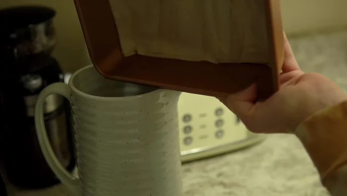 Drain and bake: Remove excess tea, and bake 5 sheets at a time for 5 minutes. Repeat until desired dryness is reached (usually 3 intervals, 15 minutes total).