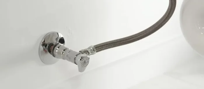 Flush the toilet and remove as much water as possible, using a shop vac for excess water.