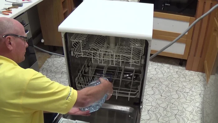 Check if the dishwasher fills with water by pouring a gallon into the tub.