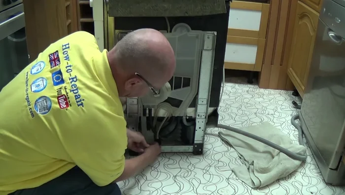 Reassemble the dishwasher, connecting all pipes and pressure bowls.