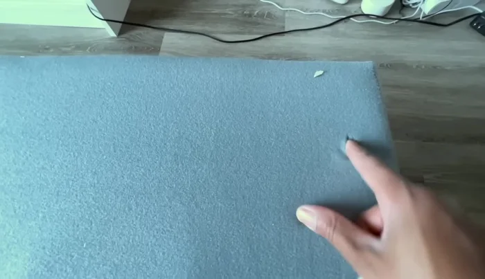 Attaching the backrests to the base.