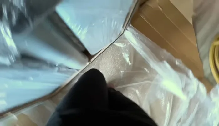 Attaching the backrests to the base.