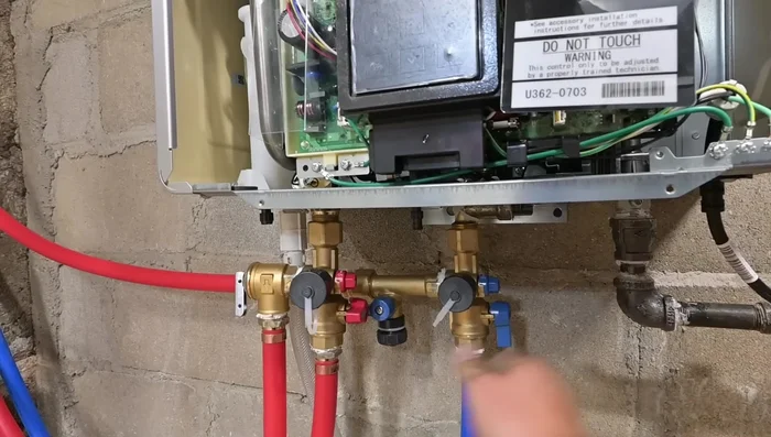 Purge air from the return line using a hose attached to the purge valve.