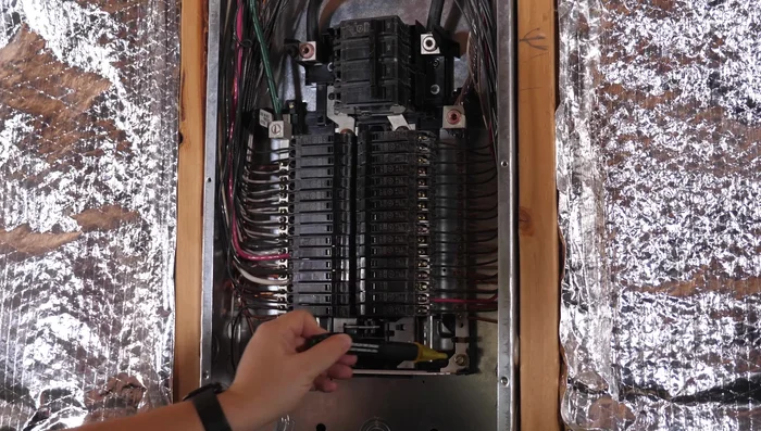 Verify power is off using a non-contact voltage tester in the breaker area.