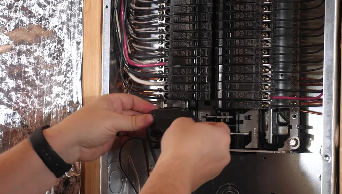 Screw the breaker back in place.