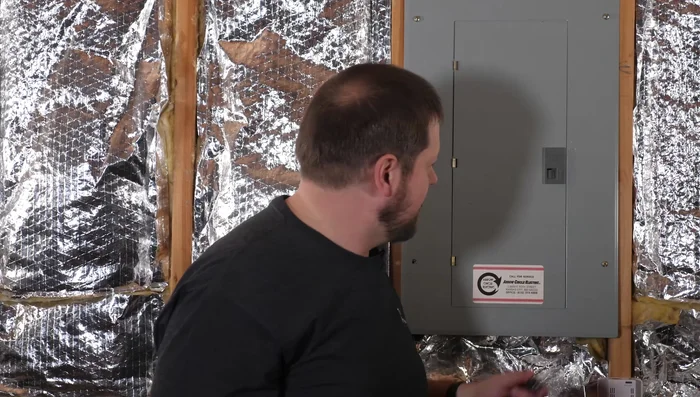 Verify power is off using a non-contact voltage tester in the breaker area.