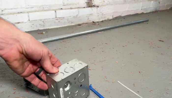 Securely mount the 4x4 boxes to the wall using appropriate fasteners.