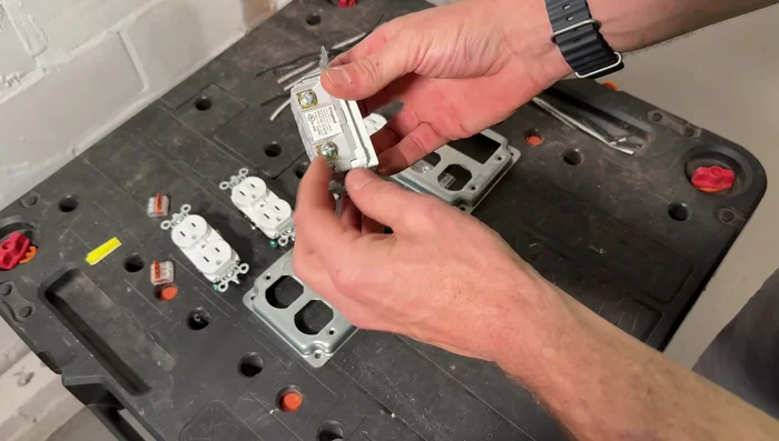 Connect the hot and neutral wires to the breaker in the panel.