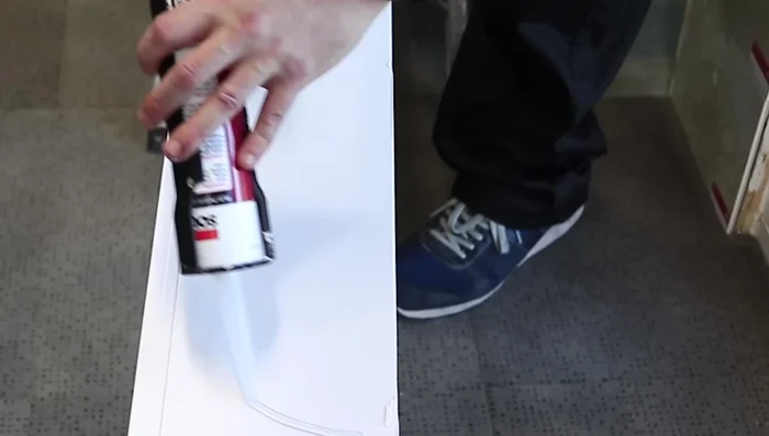 Apply silicone to the back and add this final panel to the corner.