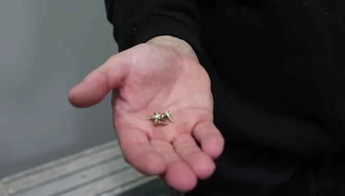 Drill 12mm countersunk screws into the trim edge at 300mm intervals.