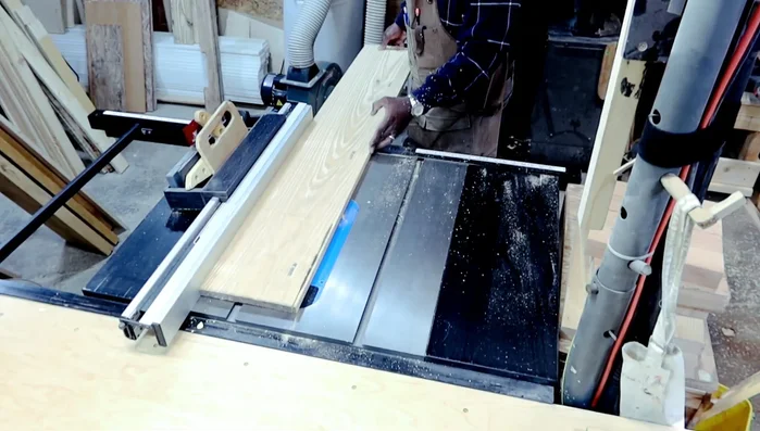 Trimming and cleaning up the edges of the bottom shelf (pallet wood).