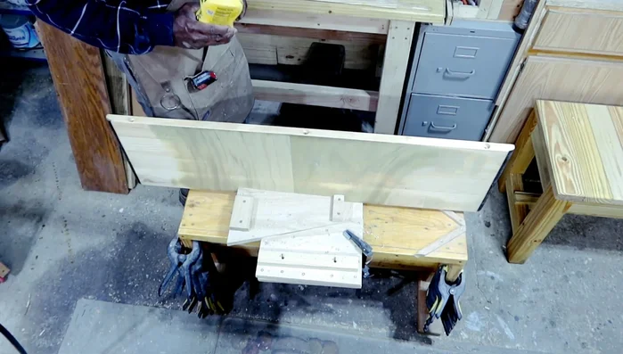 Sanding the tabletop.