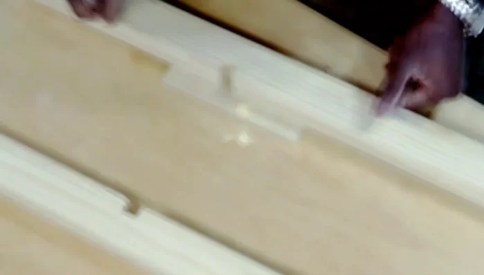 Cleaning up dados with a chisel.