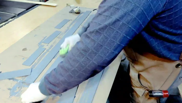 Attaching the laminate pieces with epoxy resin. Note: using too much epoxy can lead to excess squeeze-out.