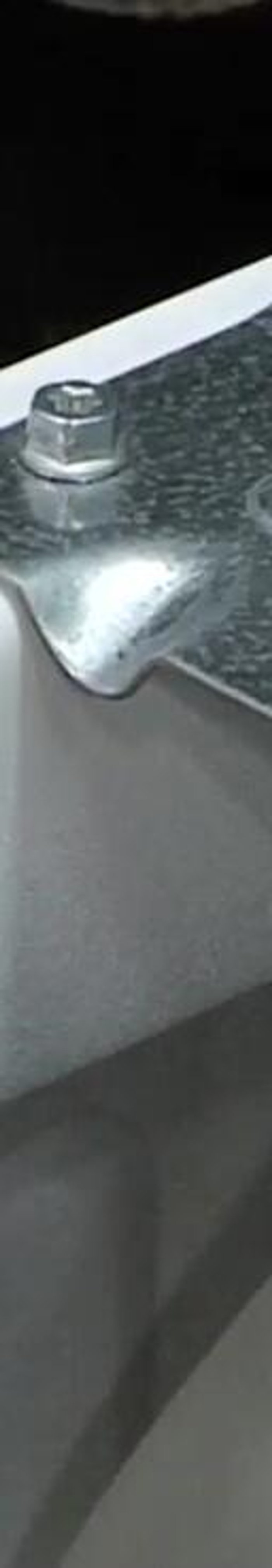 Remove the old valve. Pull out the old valve. Use pliers to remove the hose clamp and detach the hoses.