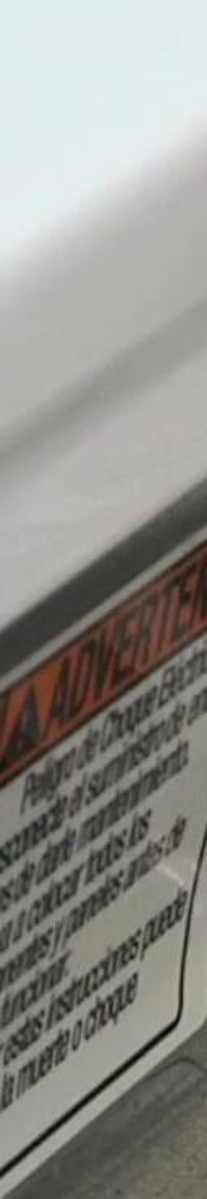 Remove the top panel. Remove three screws across the back of the machine and lift off the top panel.