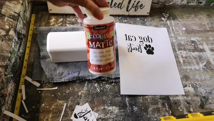 Spray with Krylon lacquer spray to make the jars water-resistant.