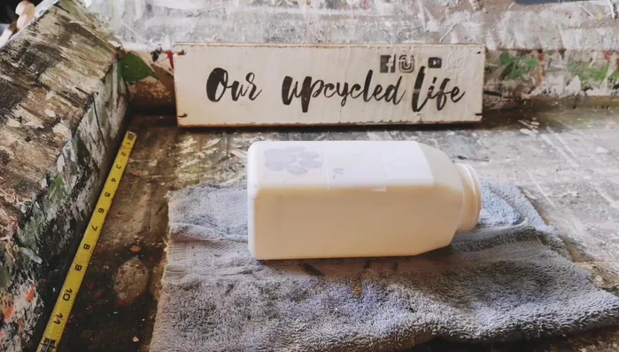 Spray with Krylon lacquer spray to make the jars water-resistant.