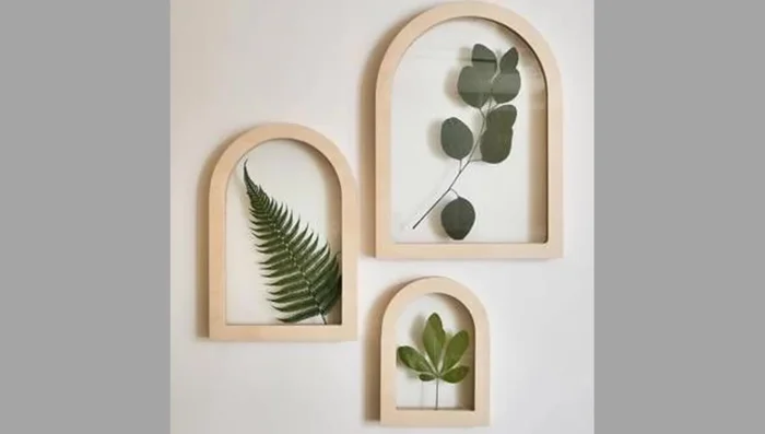 Photo Gallery with Wooden Frames: A photo gallery with wooden frames adds a personal and welcoming touch to any living space.