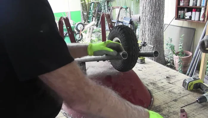 Use a center drill to mark the exact center point of the mounting pipe, ensuring the new holes are centered