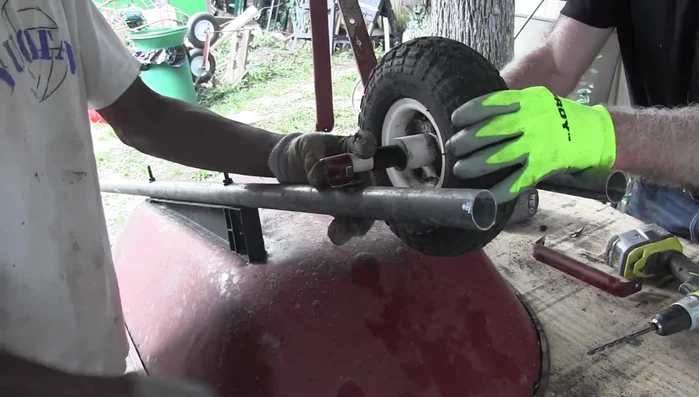 Attach the wheelbarrow brackets