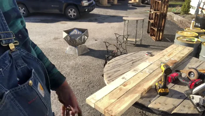 Apply several coats of dark walnut Danish oil to finish and stain the bookshelf.
