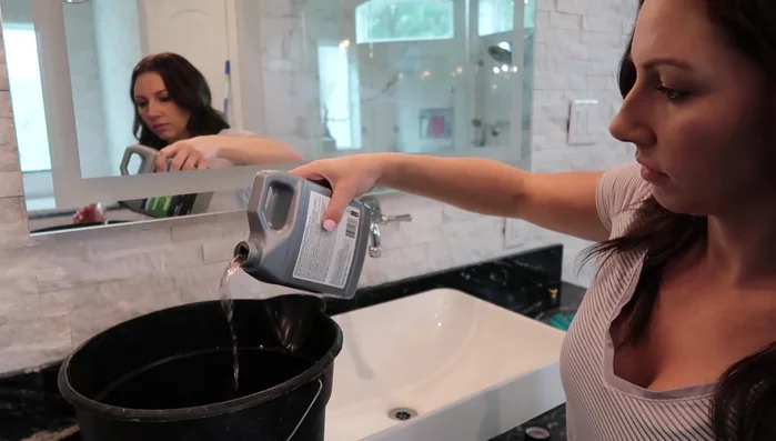 Mix the cleaning solution: Mix the Aquamix Heavy Duty Tile and Grout Cleaner with water according to the instructions on the bottle (a 1:3 ratio of cleaner to water is suggested for moderately dirty grout).