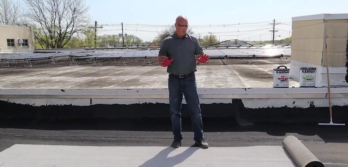 Position and roll out the membrane on the roof, allowing it to relax.