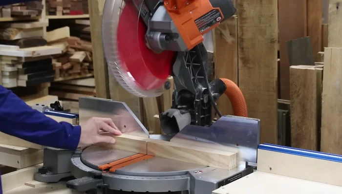 Attach side panels to the frame using pocket holes and shims (playing cards) to ensure flushness.