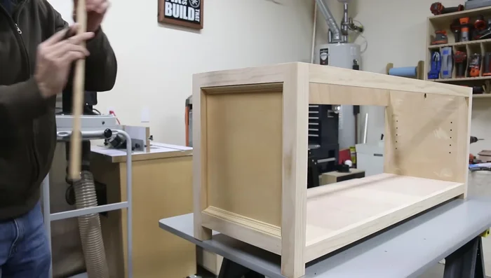 Sand, prime and paint the base.