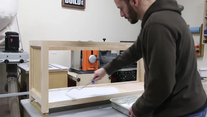 Sand, prime and paint the base.