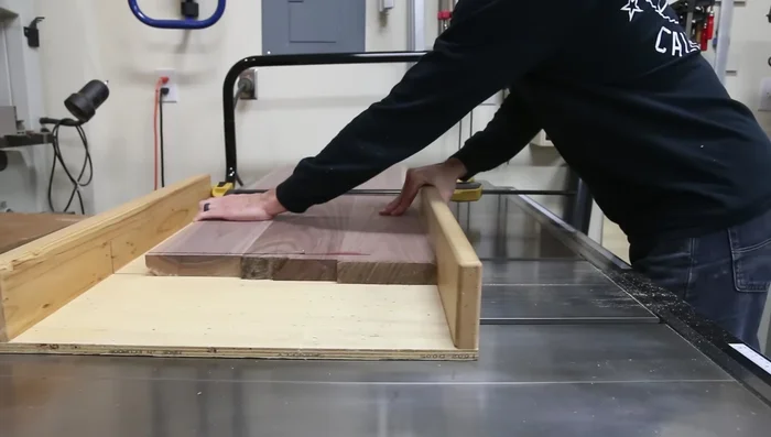 Sand the top to 220 grit and apply polyurethane finish.