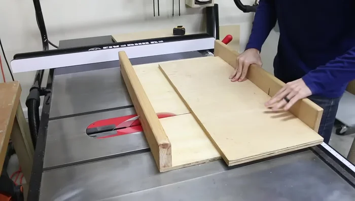 Attach side panels to the frame using pocket holes and shims (playing cards) to ensure flushness.