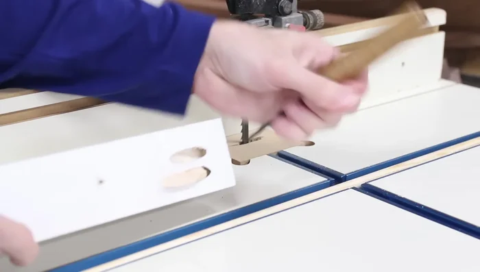 Fill pocket holes (using dowels and a hammer is recommended over wood plugs and scratch awls).