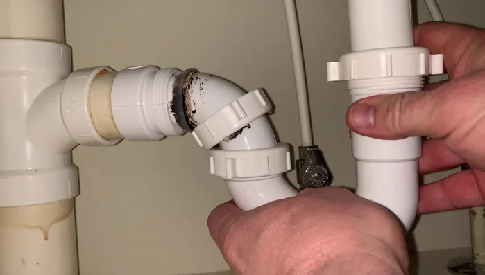 Place a bowl underneath the P-trap to catch any water.