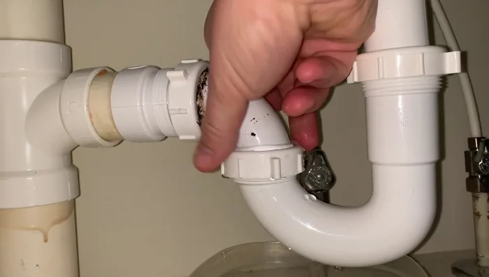 Remove the P-trap from the drain lines. Note: The P-trap might contain unpleasant substances.