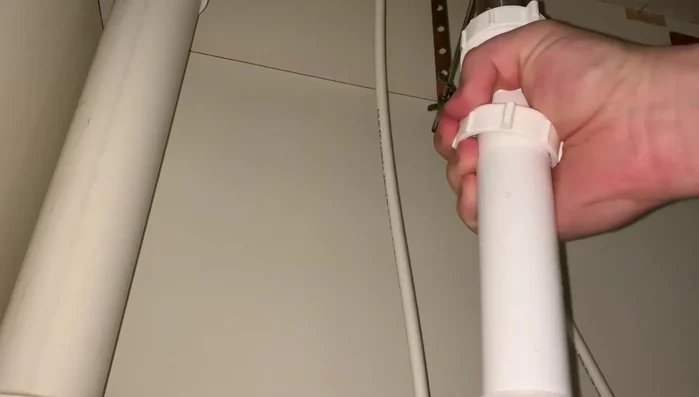 Reassemble the P-trap, ensuring the new washer is properly seated and the connections are tight but not over-tightened.