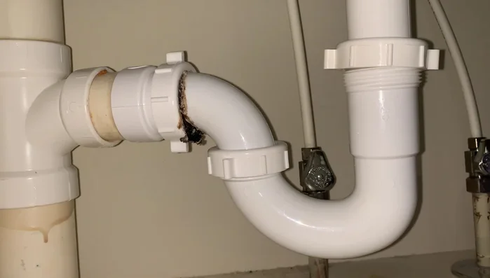 Remove the P-trap from the drain lines. Note: The P-trap might contain unpleasant substances.