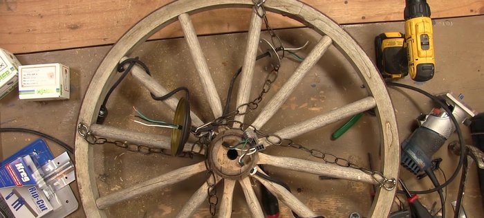 Cut wire lengths for each light (six total), drill holes in the junction box, pass wires through, and secure with wire staples.